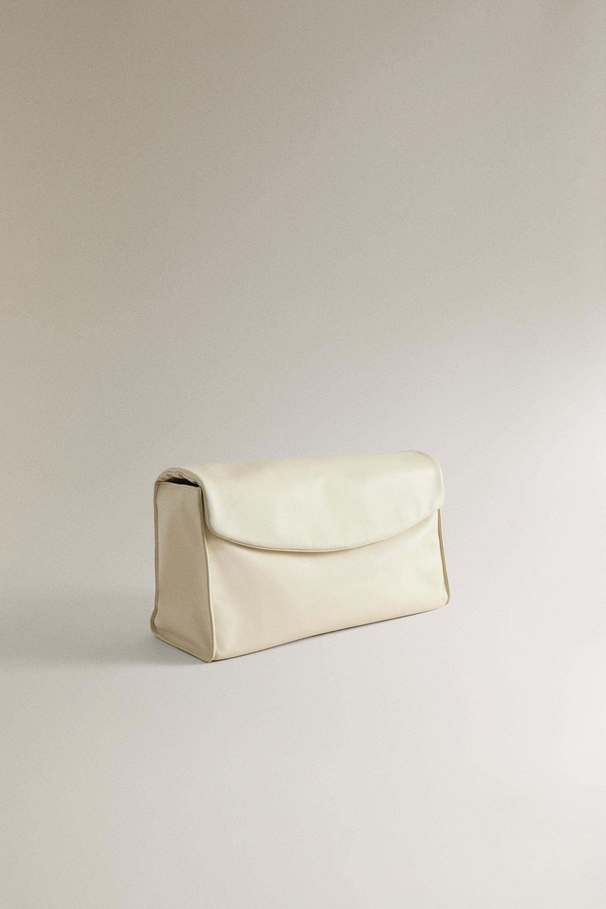 LEATHER FLAP MAKEUP BAG — 