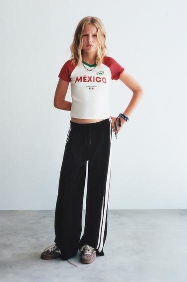 WIDE-LEG TROUSERS WITH TAPING - Black by Zara