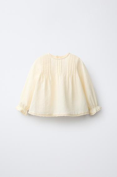 CHEMISE À PLIS NERVURÉS ET DENTELLE - Écru de Zara