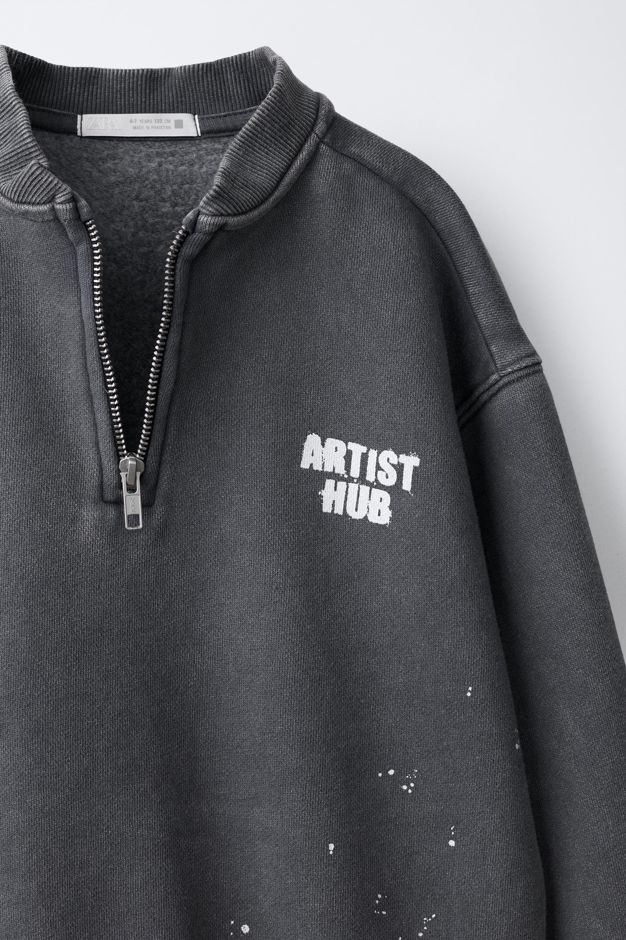 SWEAT EFFET DÉLAVÉ PEINTURE