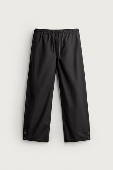 PANTALÓN RELAXED FIT BOTONES - Negro de Zara
