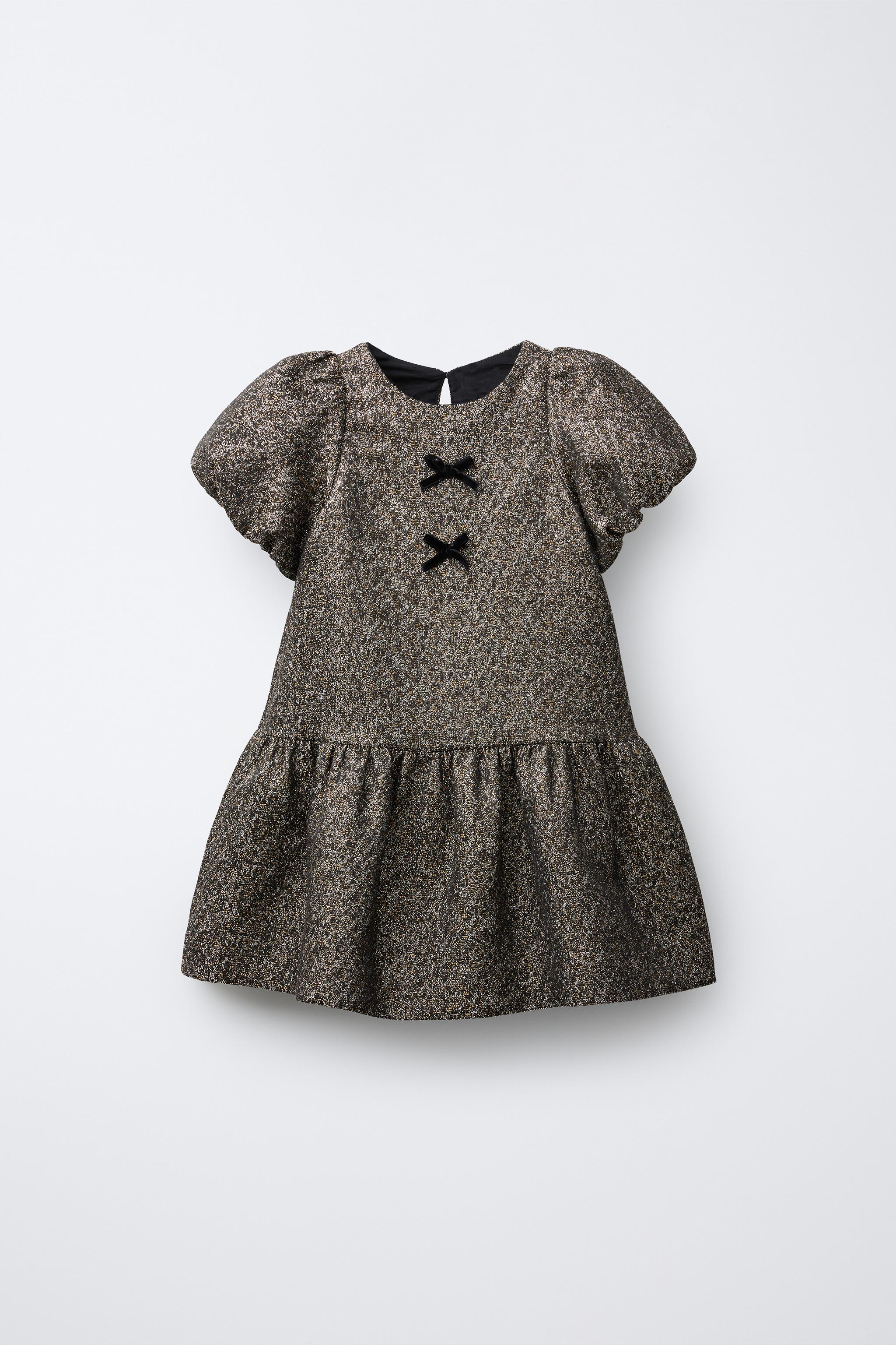 ROBE BRILLANTE AVEC NŒUDS EN VELOURS