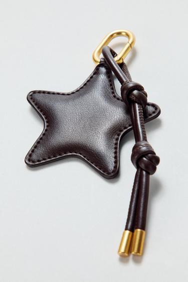 حلية نجمة - مِحْمر الخاص بـ Zara