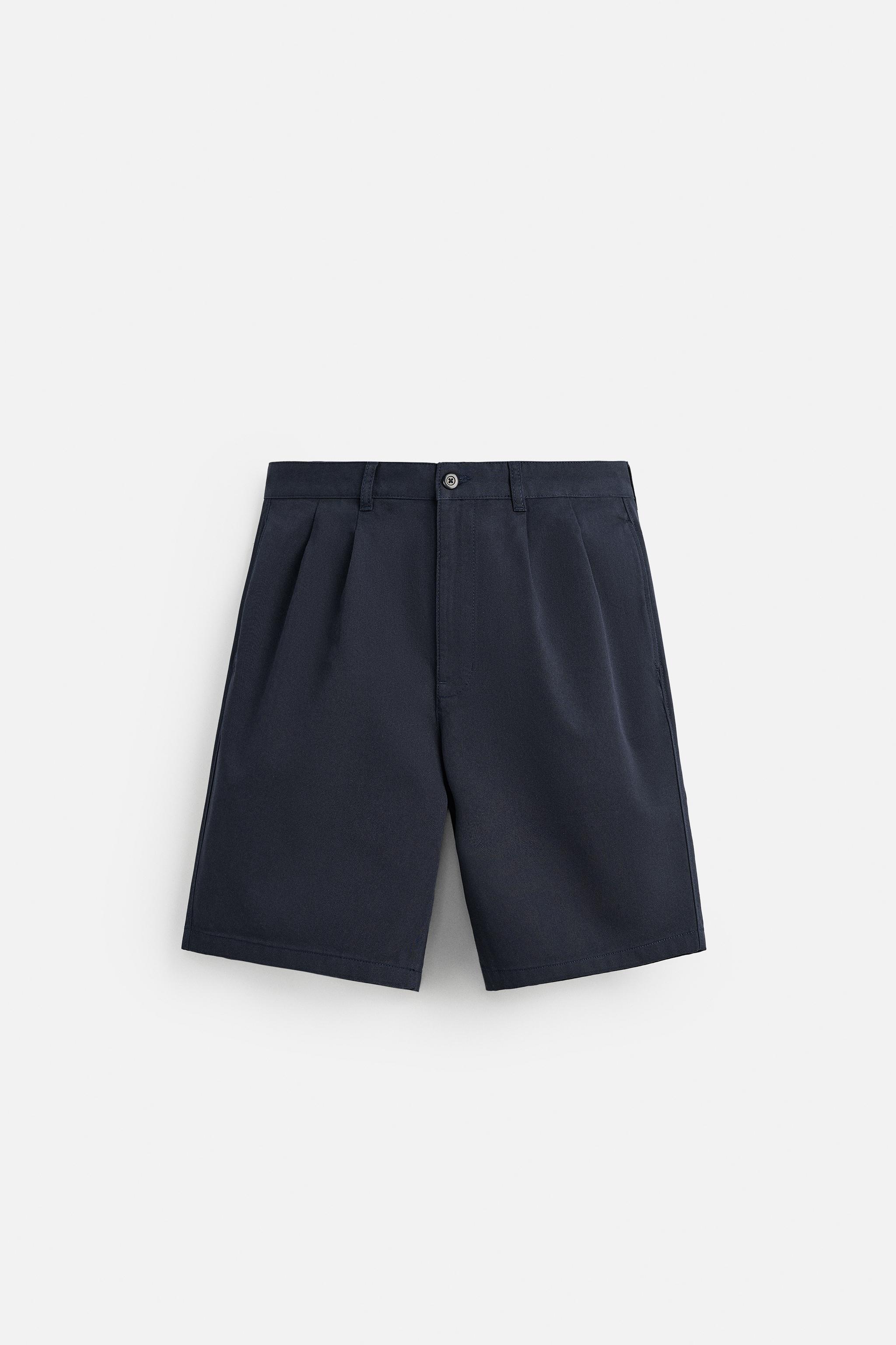RELAXED FIT PLEATED SHORTS