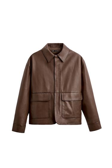Front view of a brown jacket with large front pockets and concealed fastening.