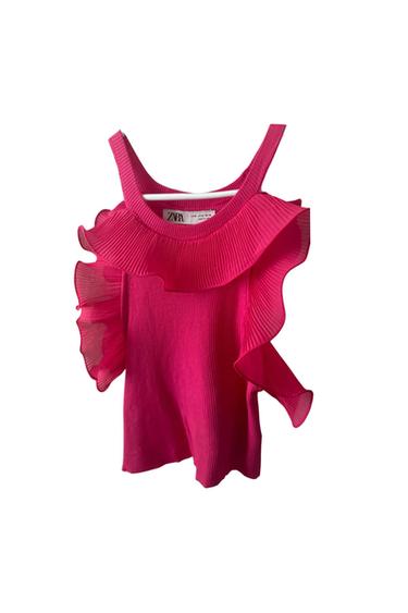 RUFFLED BLOUSE.