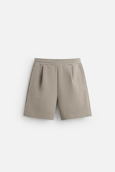 INTERLOCK PLEATED BERMUDA SHORTS - Stone by Zara