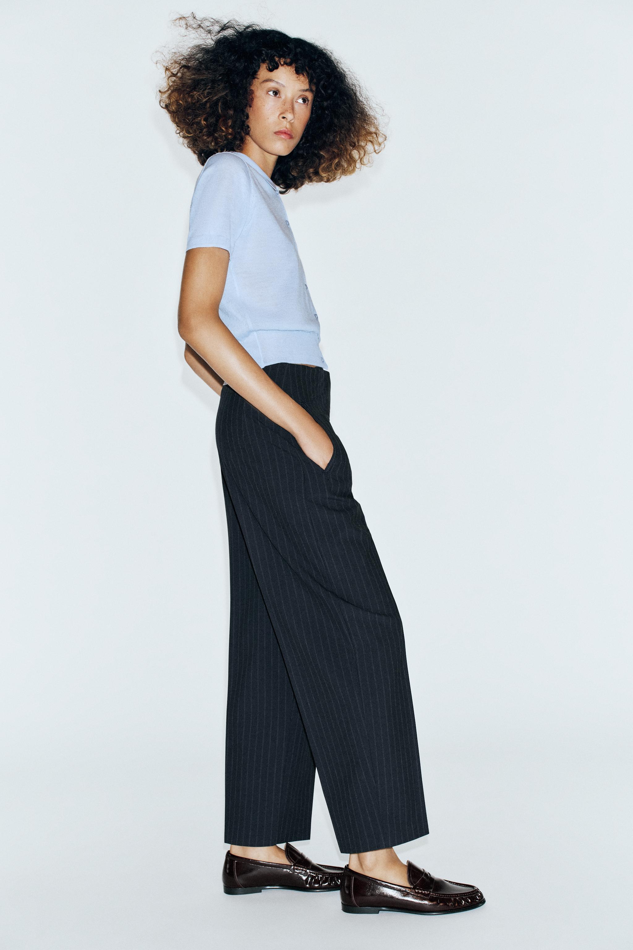 HIGH-RISE BARREL-LEG PANTS