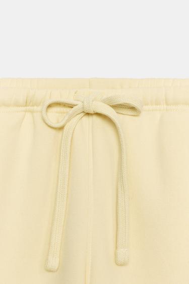 BASIC STRAIGHT-LEG PLUSH TROUSERS WITH ADJUSTABLE HEM - Yellow by Zara - Image 9