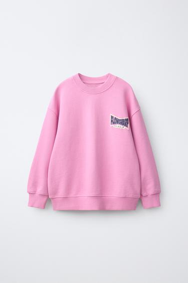 SUDADERA TEXTO RELIEVE - Rosa / Blanco de Zara - Imagen 0