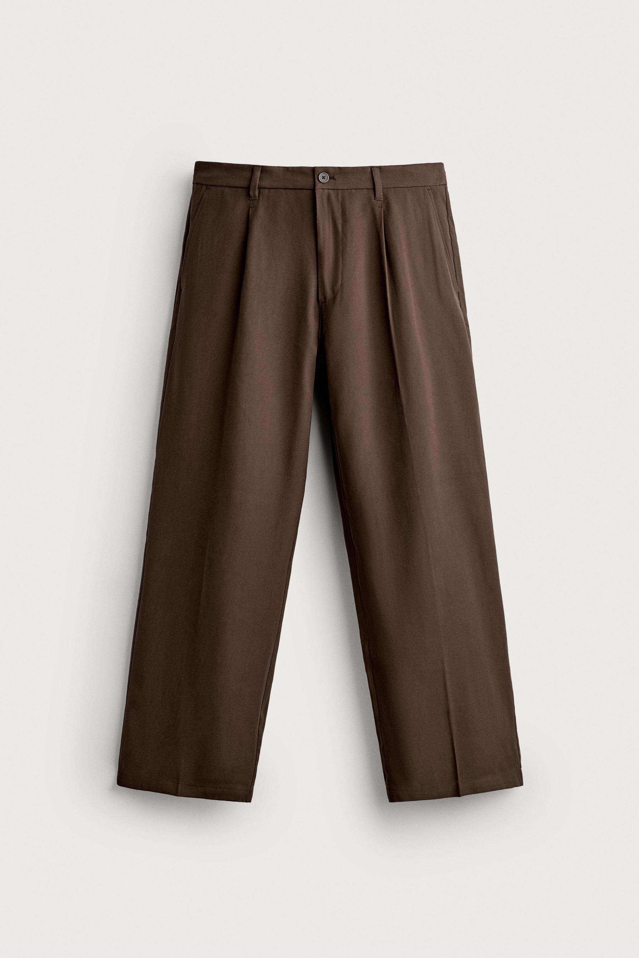FLOWY RELAXED FIT PLEATED PANTS — Brown
