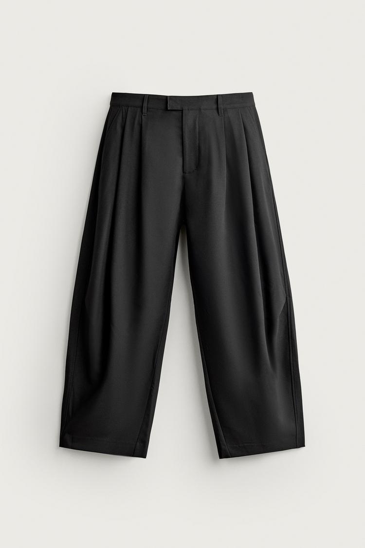 RELAXED FIT PLEATED TROUSERS