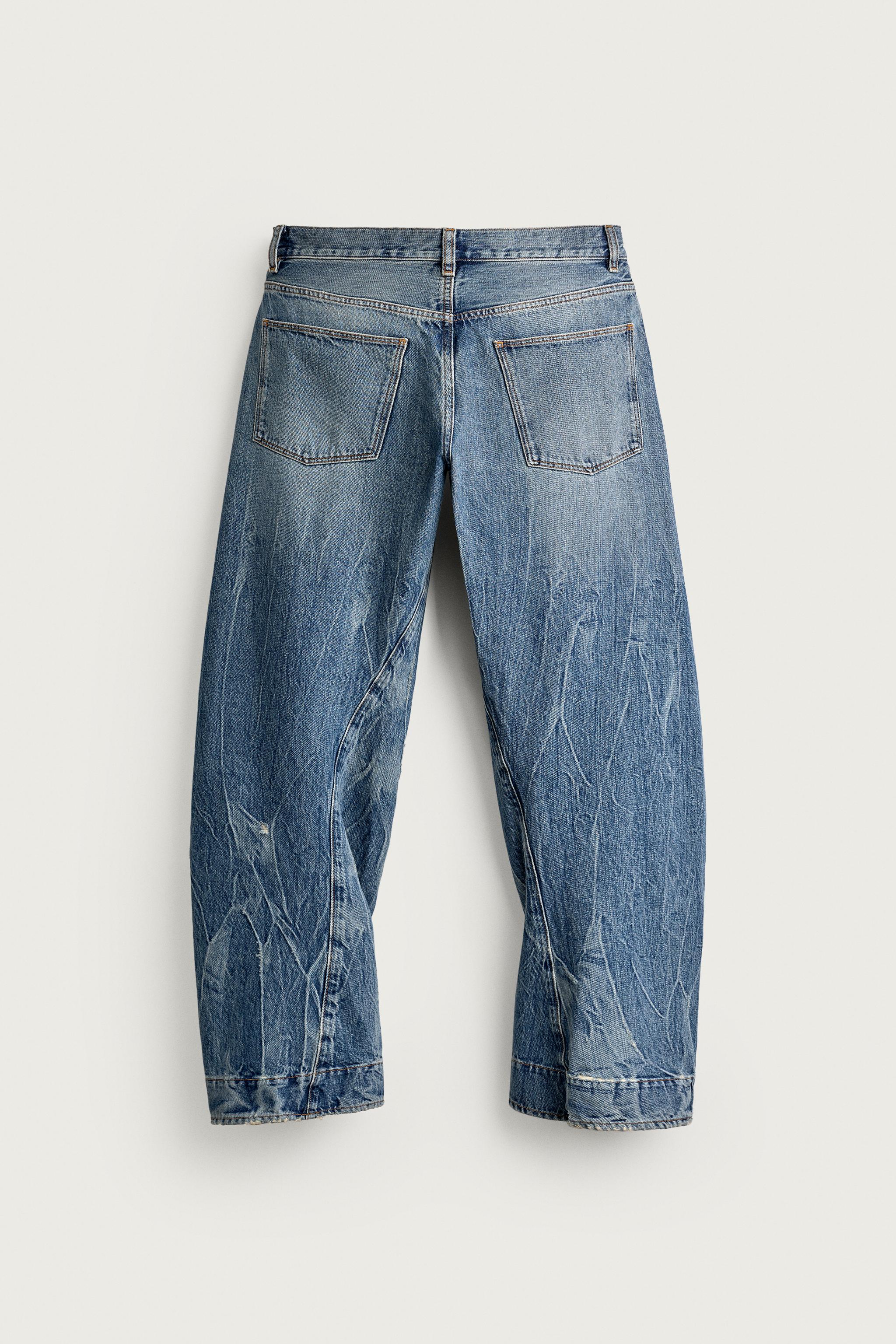 JEANS STRAIGHT FIT COSTURA GIRADA