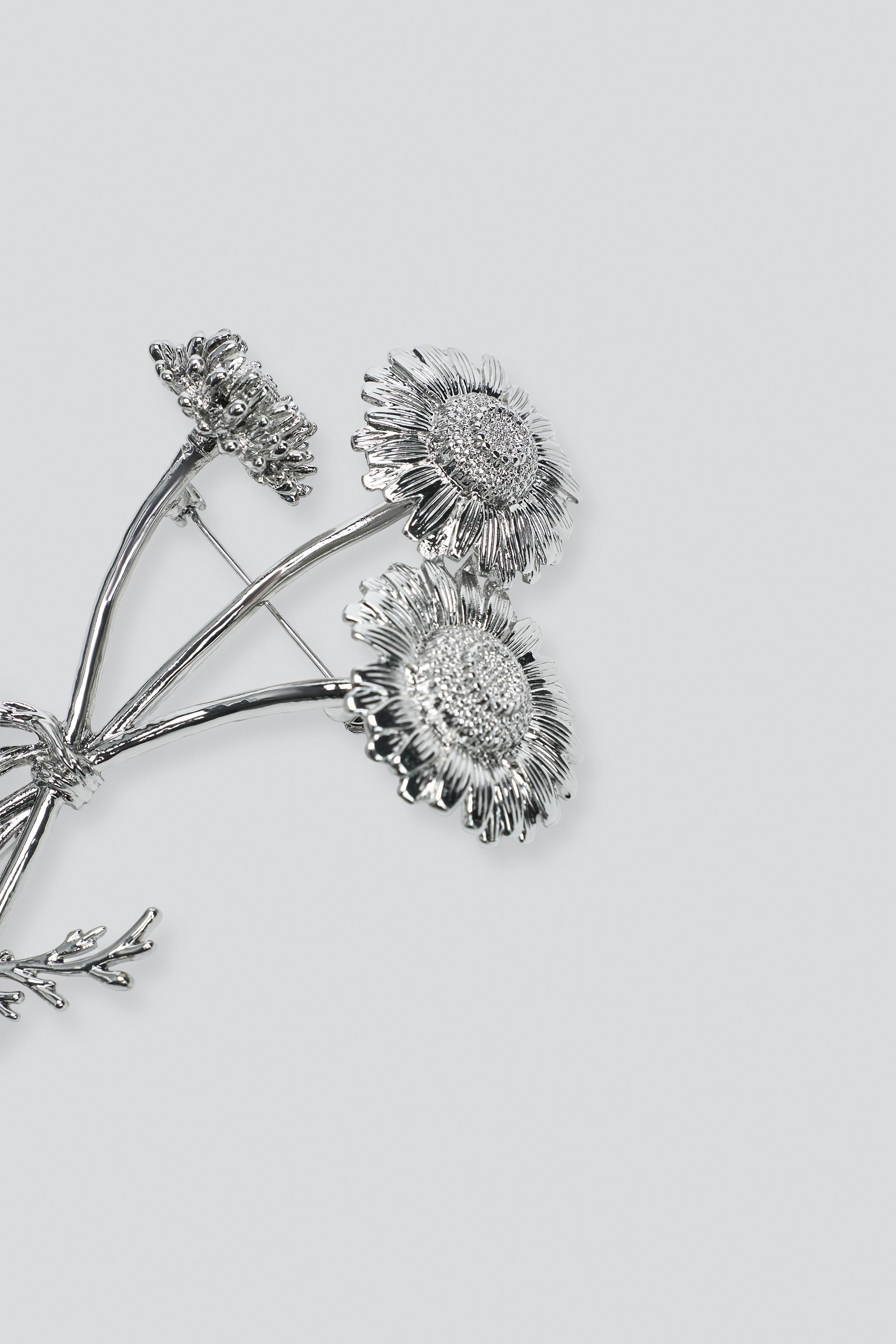 BROCHE MÉTALLIQUE 3 FLEURS