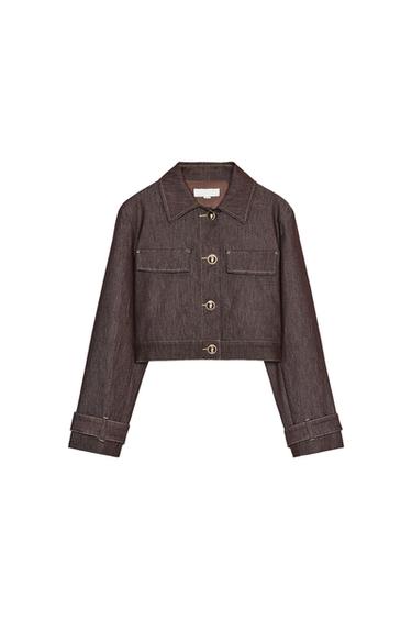 Front view of a short brown jacket with a shirt collar, long sleeves, front flap pockets, and button closure.