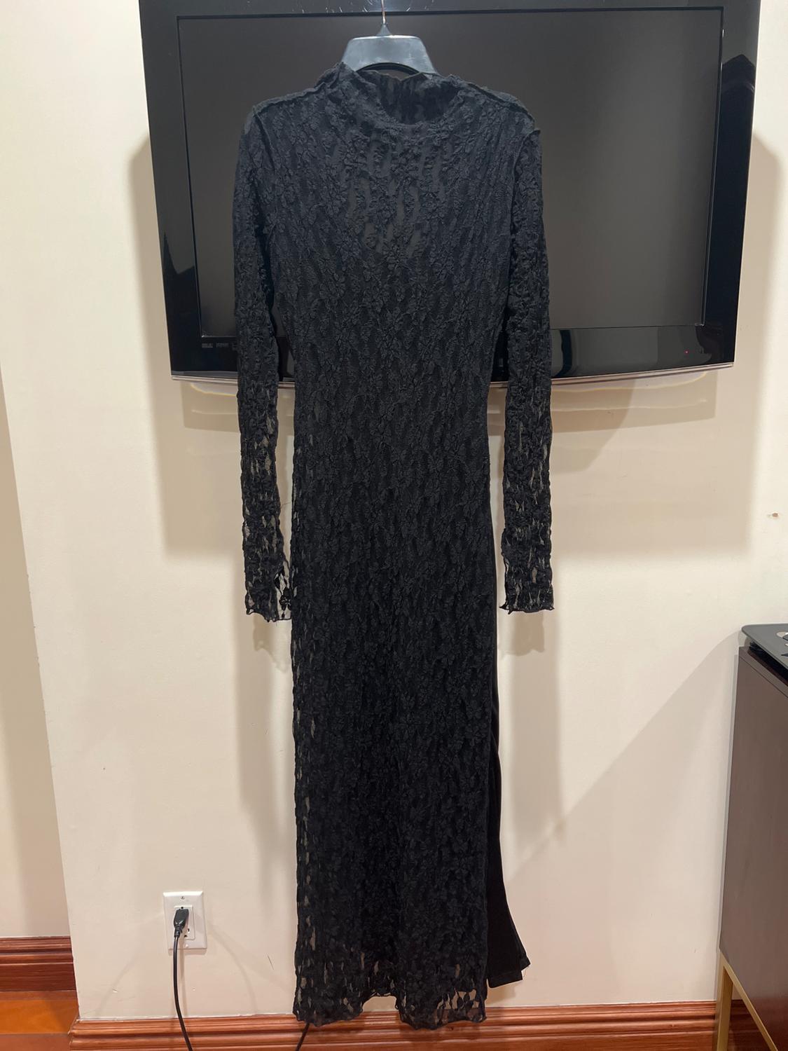 High collar midi dress with long sleeves. Tonal interior lining. Back hidden in-seam zip closure.