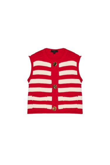 Front view of red vest with white stripes and large gold buttons.