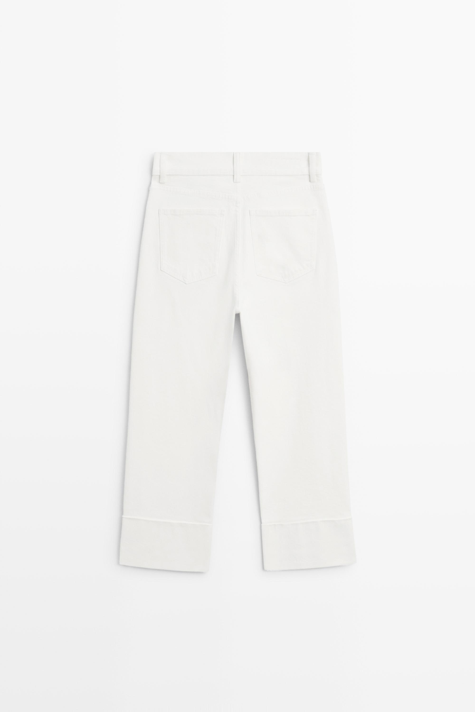 Jean capri taille moyenne retroussé