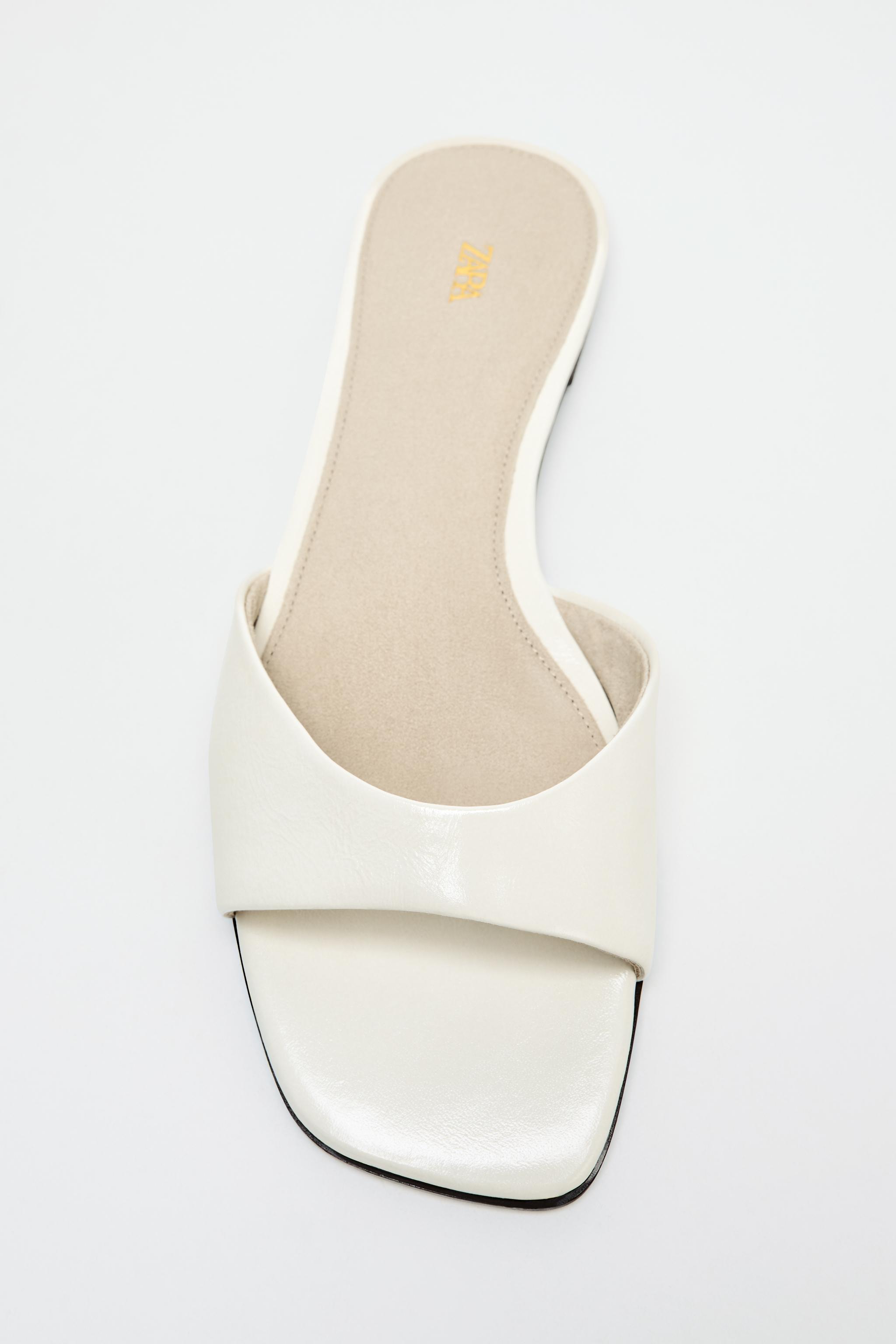 FLAT LEATHER SANDALS