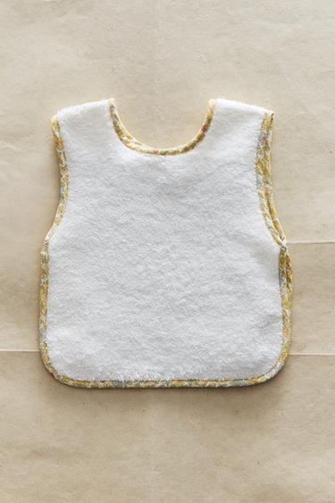 BABERO INFANTIL PIPING FLOR - Crema de Zara