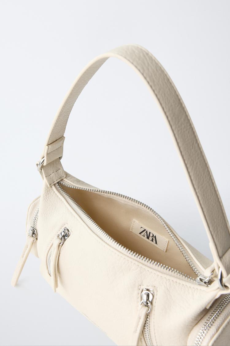 Bolsa de hombro con detalle de cierre 4