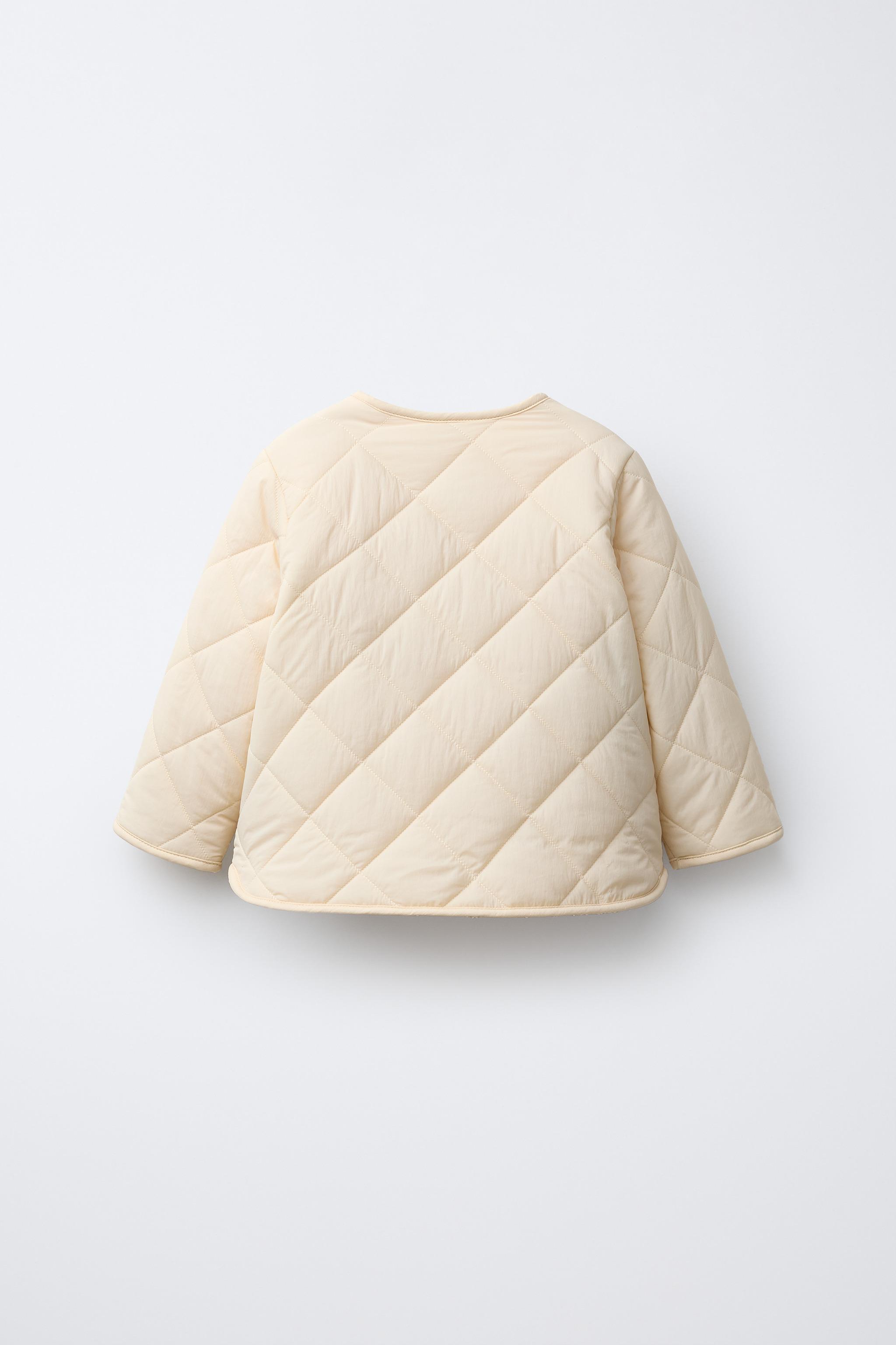 BLOUSON EN NYLON DÉPERLANT AVEC DOUBLURE MOUTONNÉE