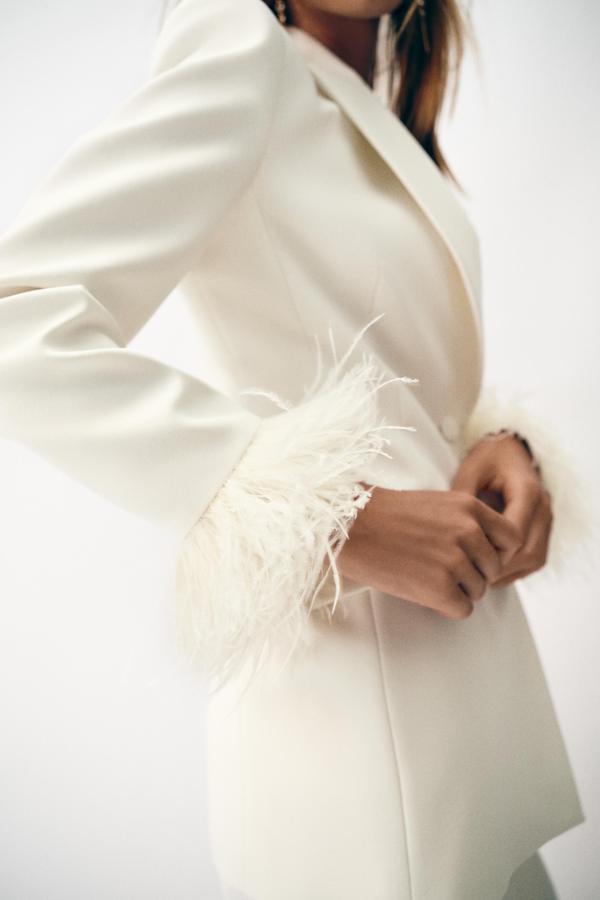 BLAZER WITH FEATHER CUFFS
