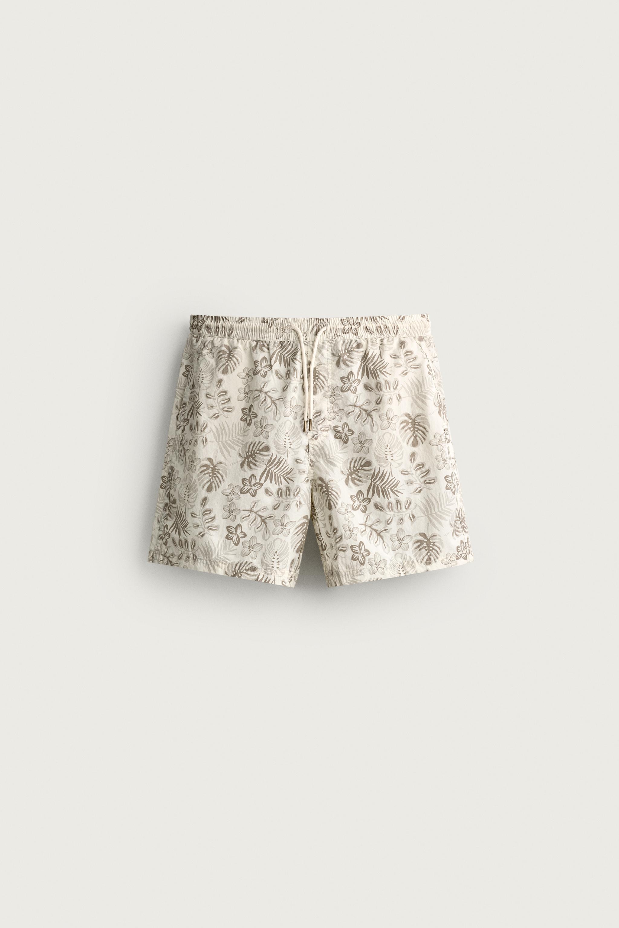 LONG FLORAL PRINT SWIM SHORTS — Ecru
