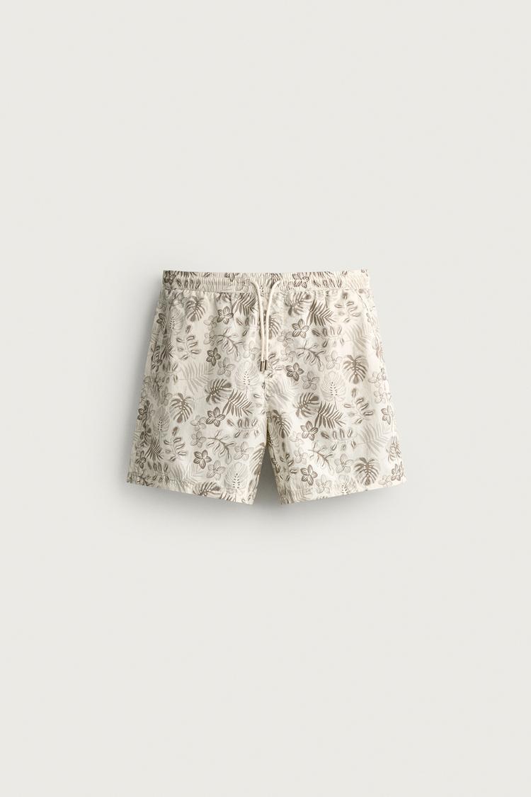 LONG FLORAL PRINT SWIM SHORTS — Ecru
