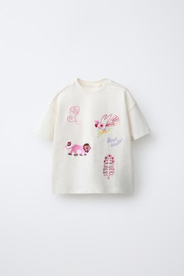 T-SHIRT MIT STICKEREI SISSEL EDELBO X ZARA KIDS - Cremefarben von Zara - Bild 0
