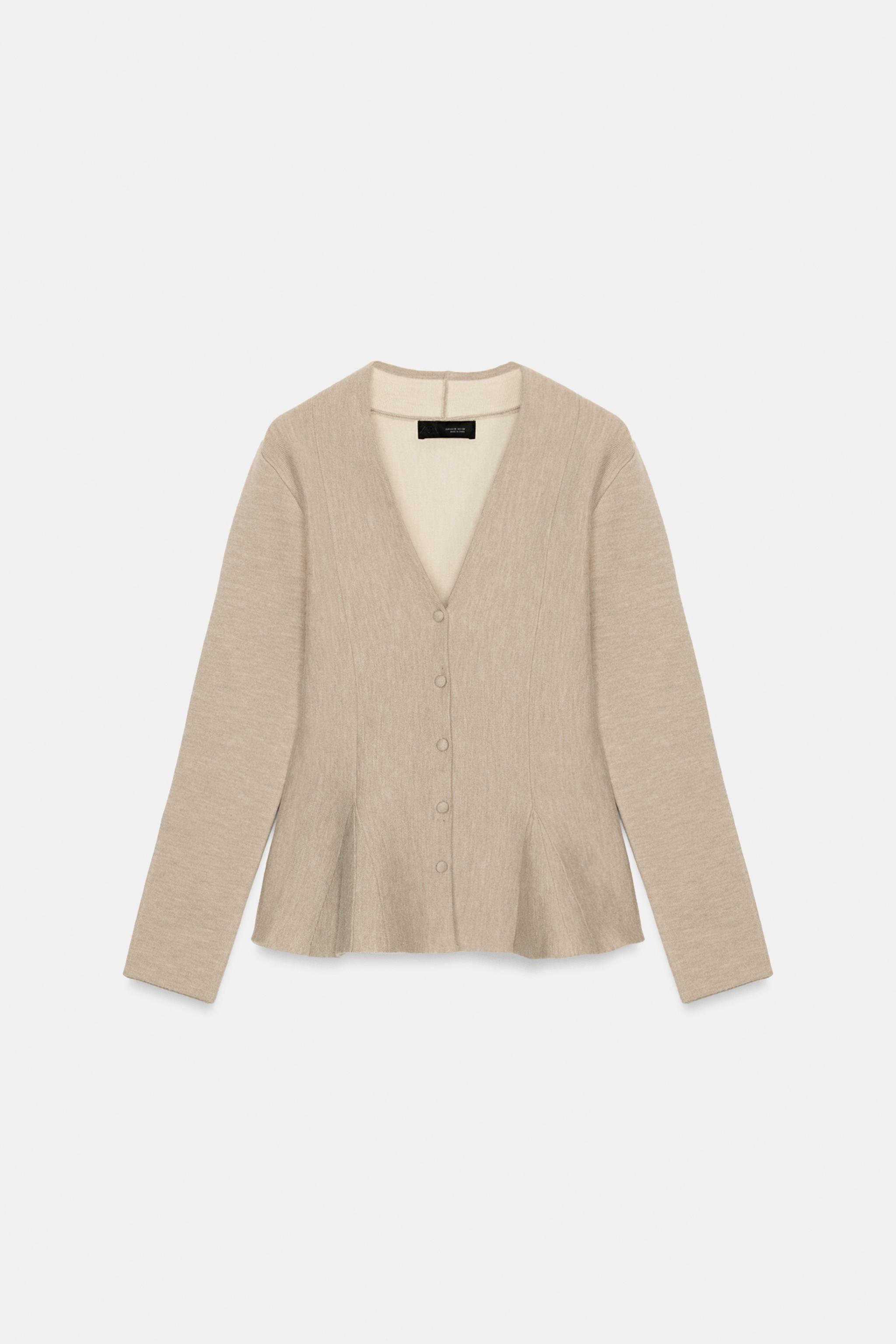 GILET EN MAILLE PEPLUM