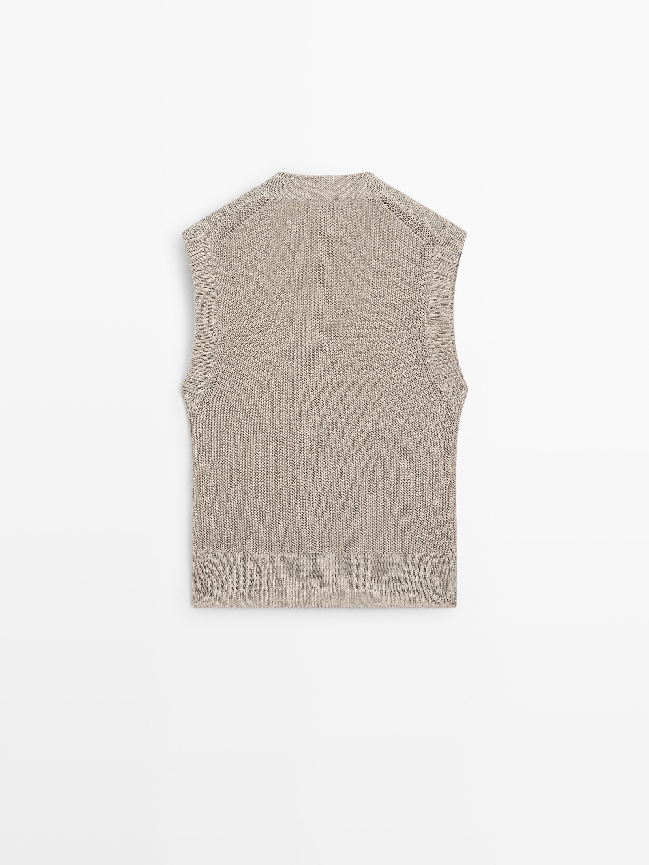 Knit vest with a high neck