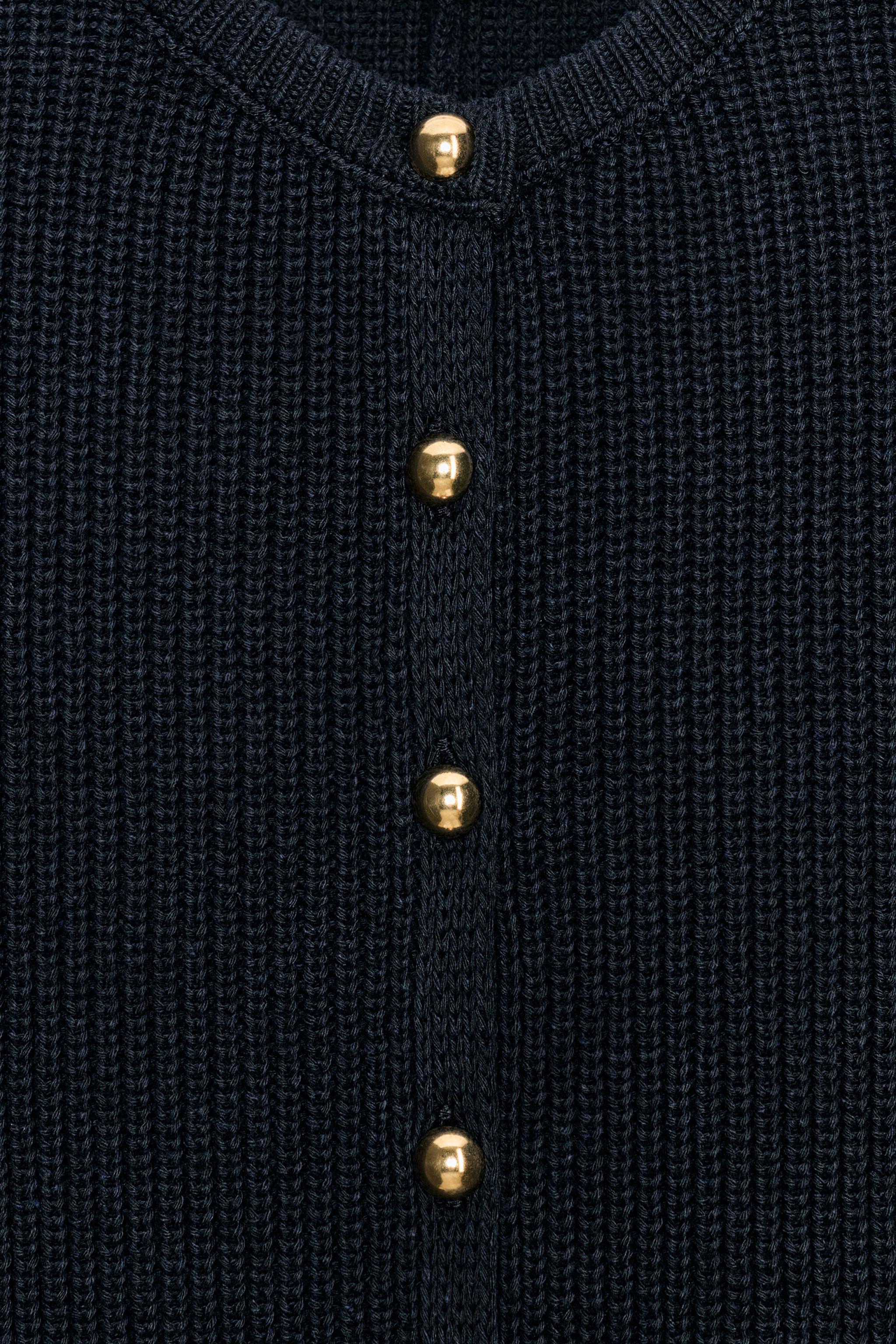 KNIT PEPLUM JACKET