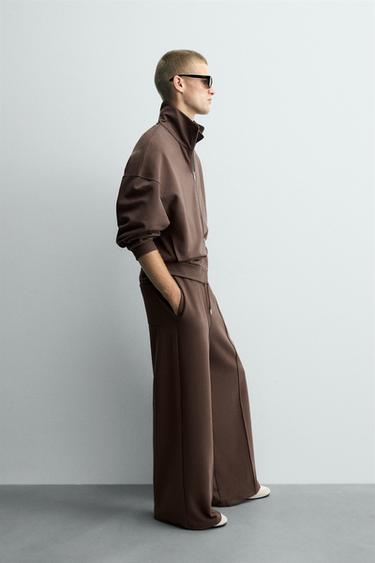 بنطلون بمظهر النيوبرين مع رقعة - شوكولاتة الخاص بـ Zara