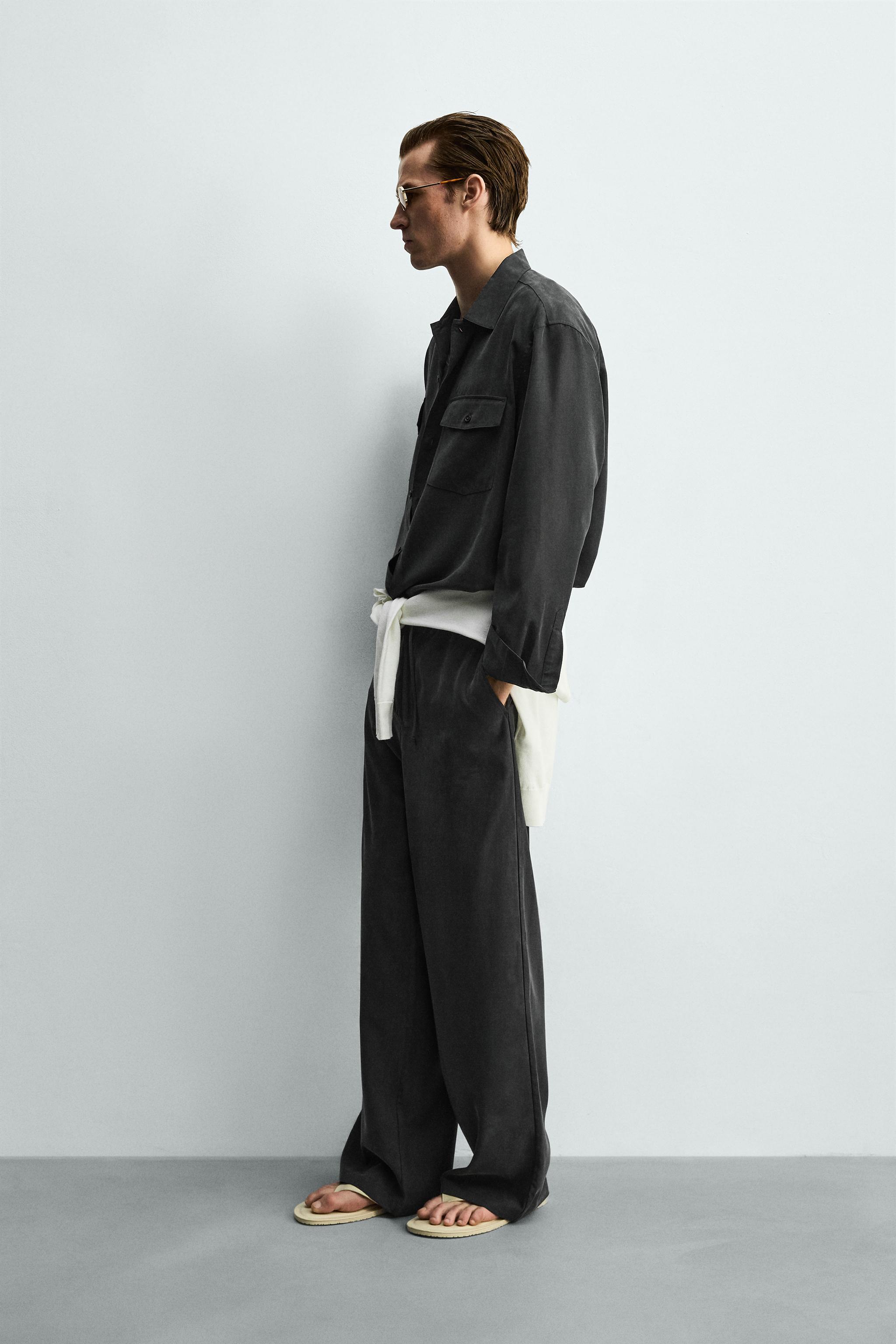 RELAXED FIT FLOWY PANTS