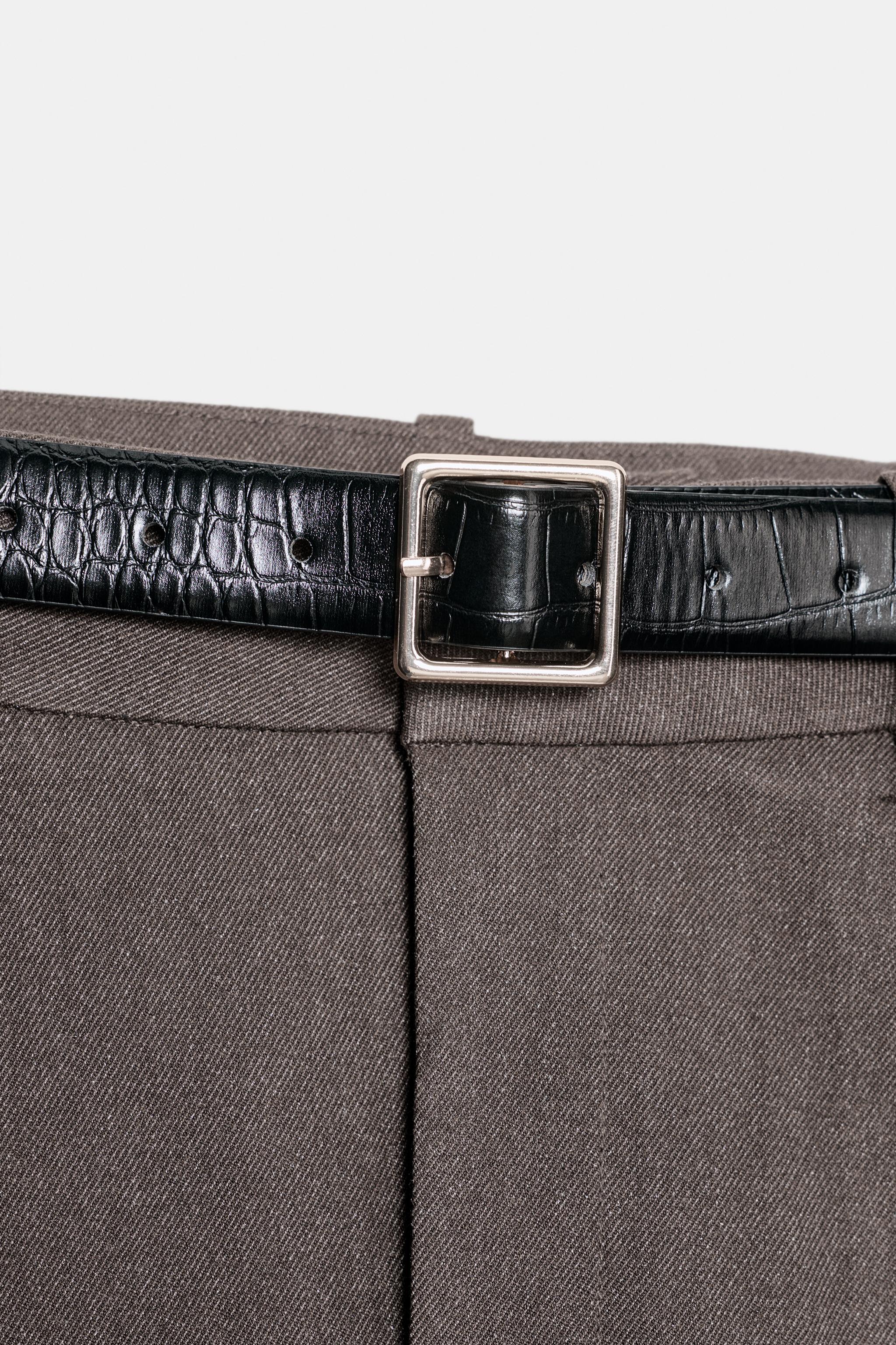 PANTALON AVEC REVERS ET CEINTURE