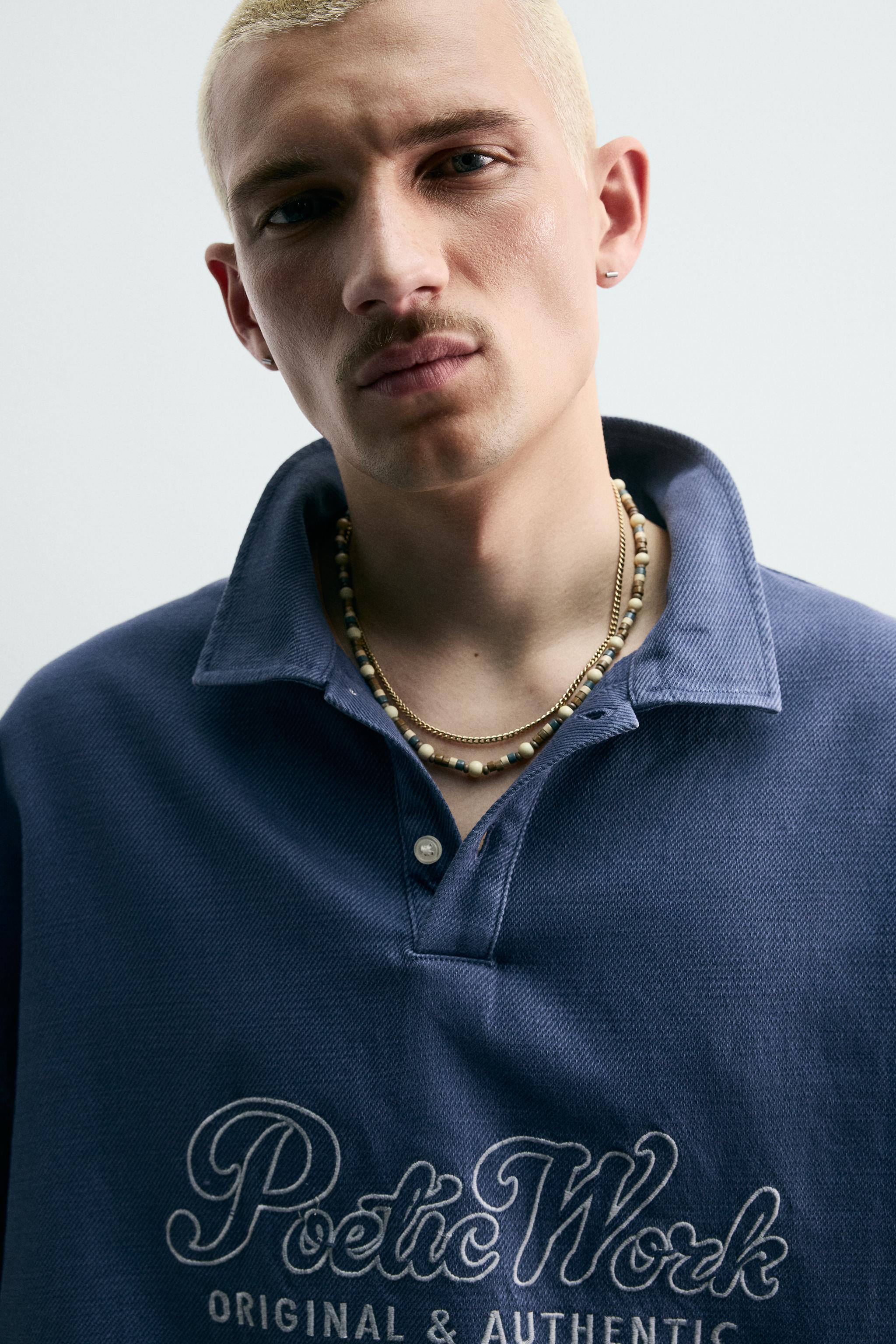 EMBROIDERED TEXT BOXY FIT POLO SHIRT