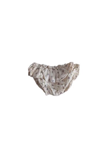 CULETIN BEIGE CON VOLANTES
