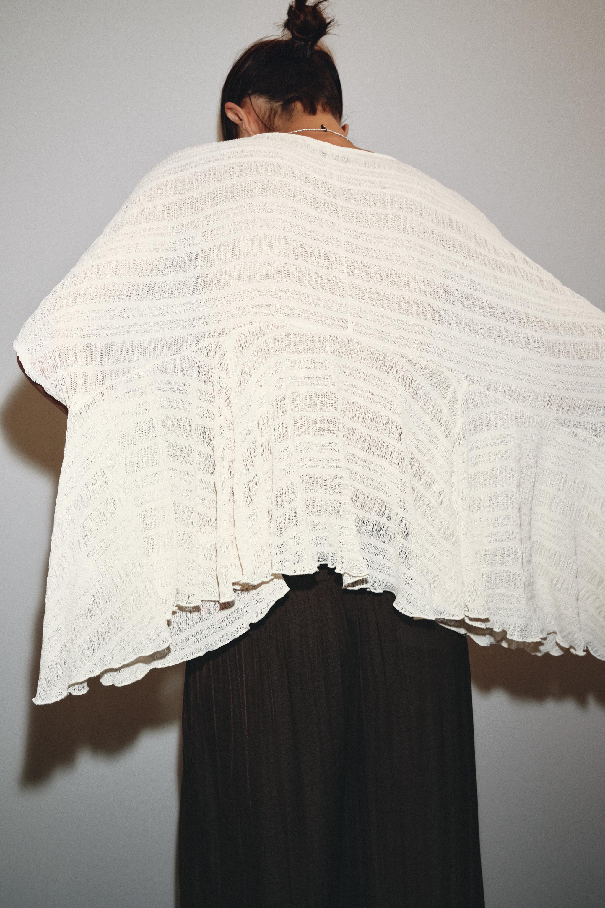 ASYMMETRIC TEXTURED CAPE