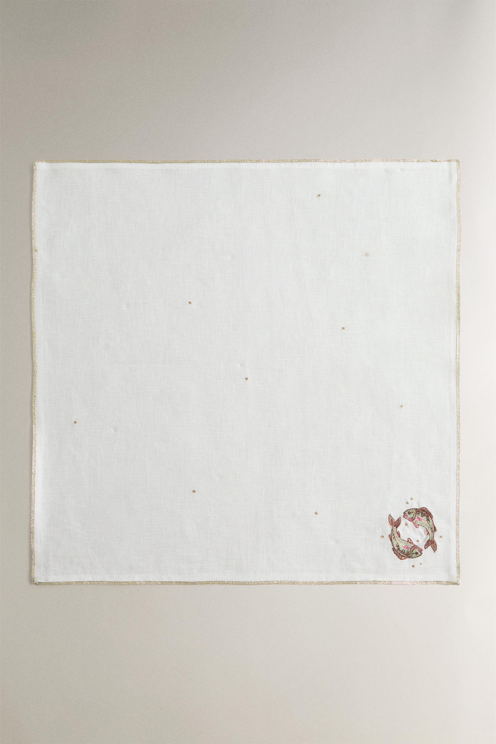 EMBROIDERED LINEN NAPKIN PISCES | MARISA BERENSON — Ecru