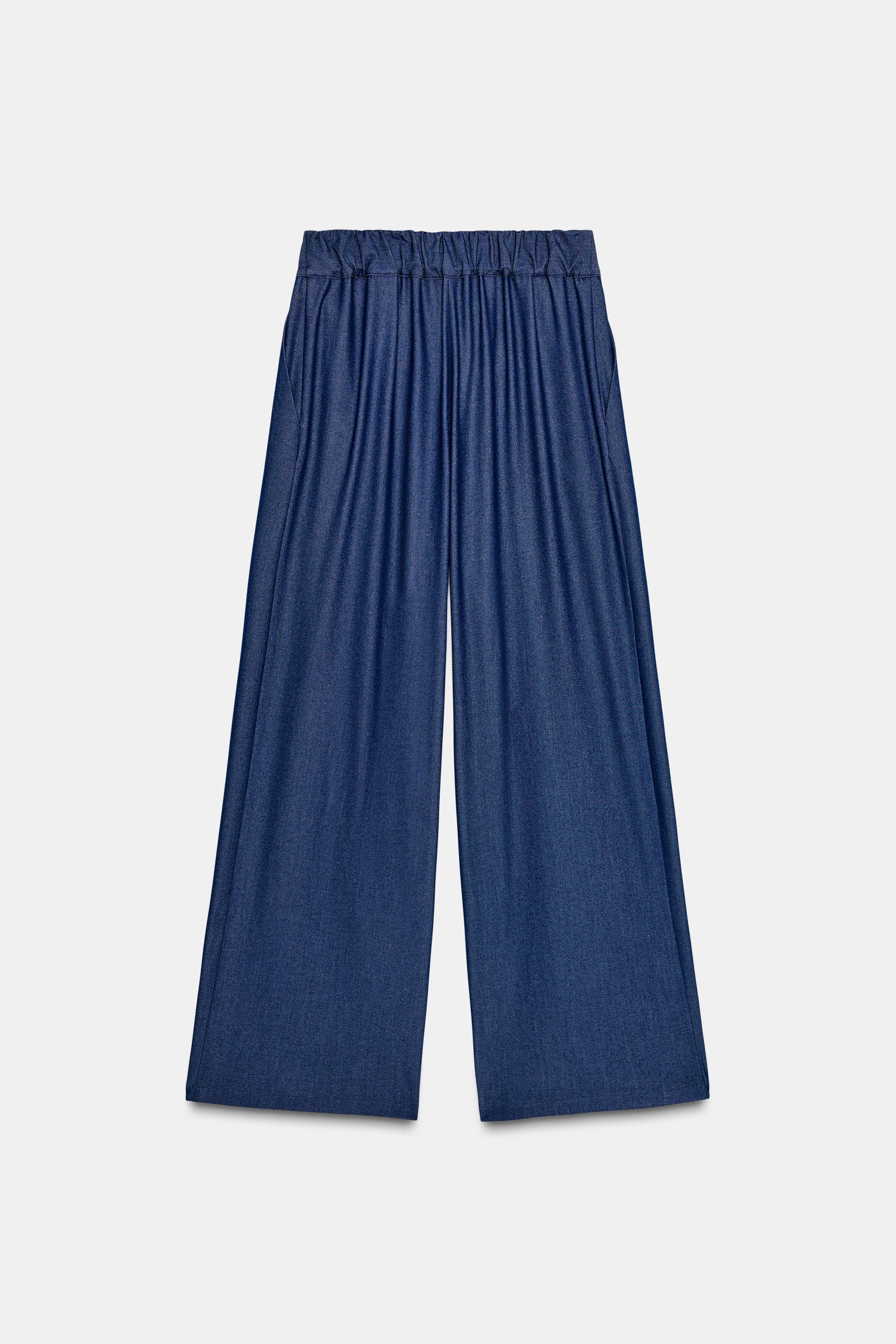 WIDE LEG PLEATED PANTS