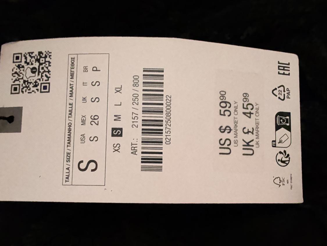 QR code clothing tag, size S, price US $59.90, UK £45.99, and recycling symbols. Item code: 2157/250/800.