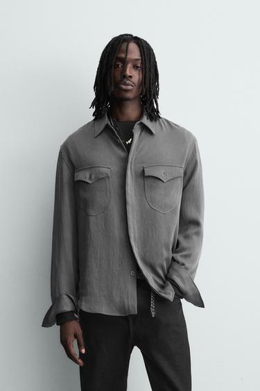 CAMISA FLUIDA AMB BUTXAQUES - Gris de Zara