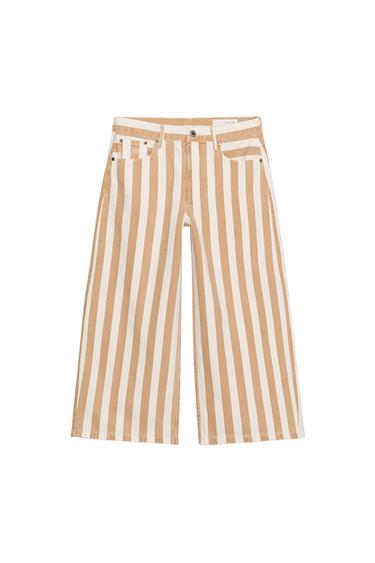 Front view of medium ecru vertical striped culotte pants, mid-rise, wide leg, five pockets, zipper and button.