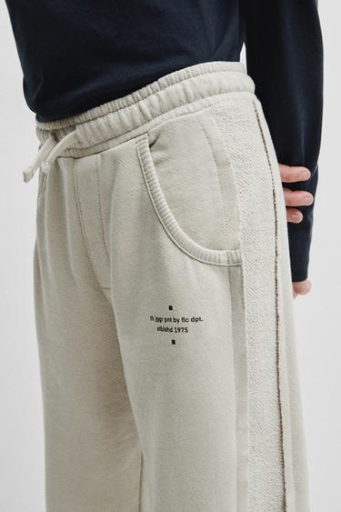 מכנסי טרנינג קטיפתיים בשילוב בדים - בז' של Zara