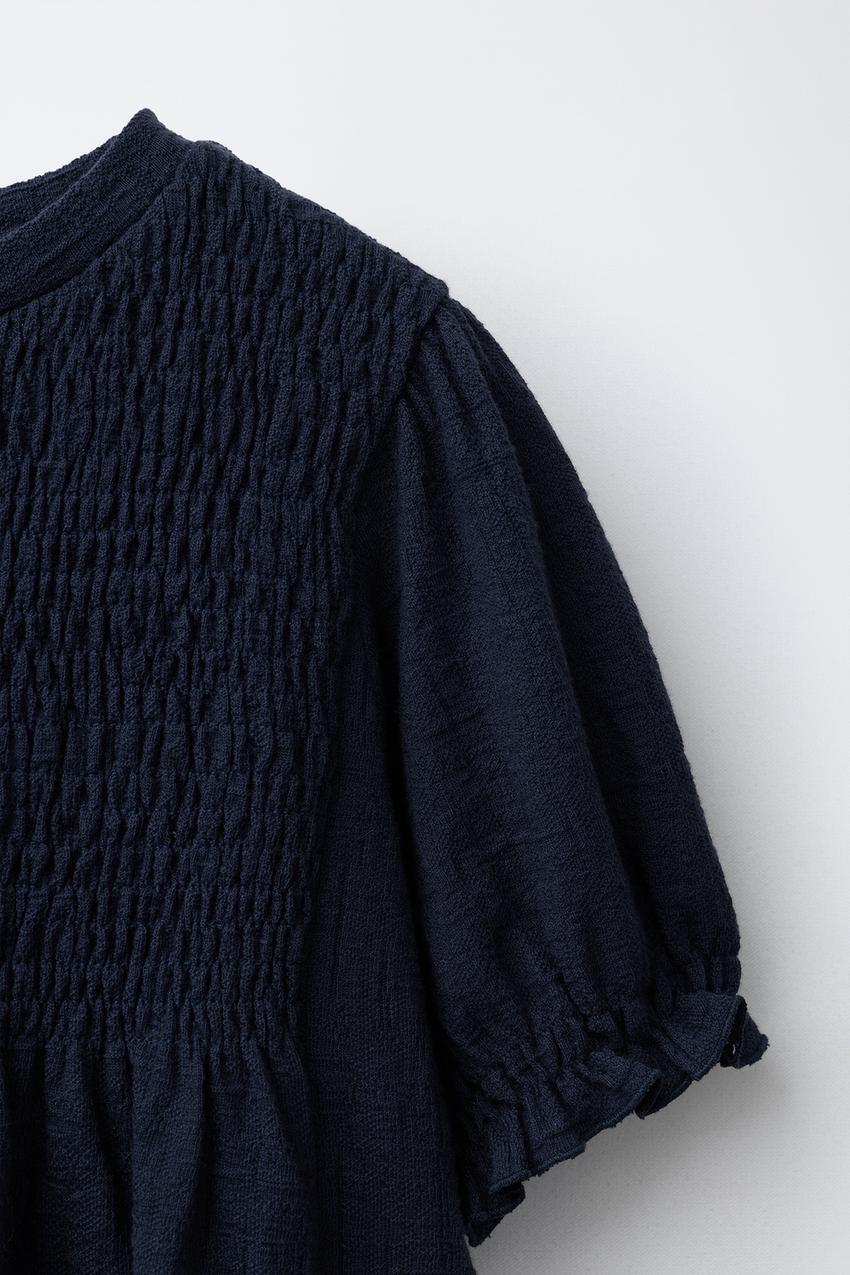 TEXTURED OVERSIZED BLOUSE