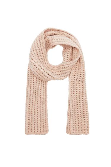 Front view of a beige knitted scarf with a ribbed texture.