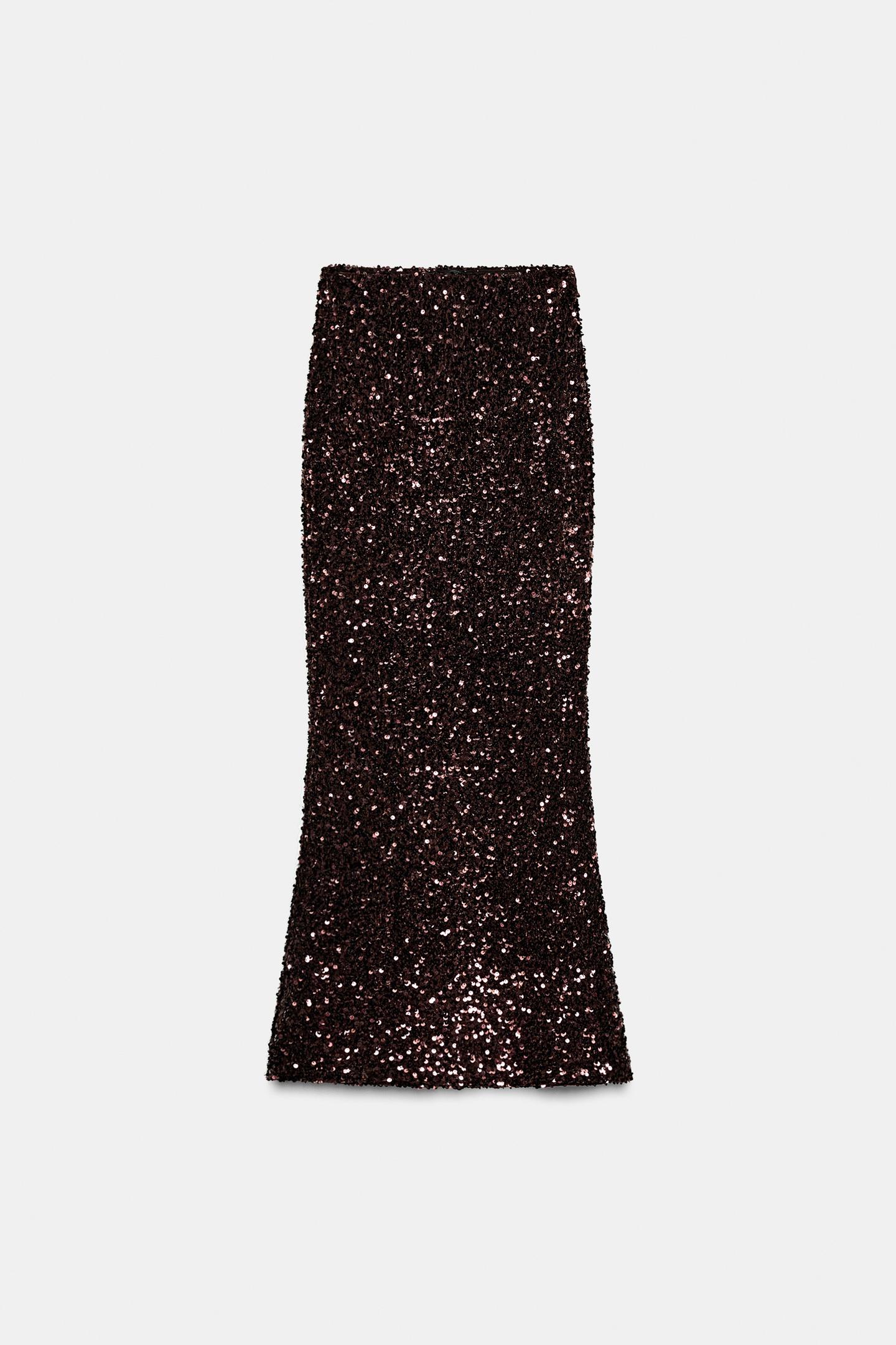 Front view of a long brown sequinned A-line skirt.