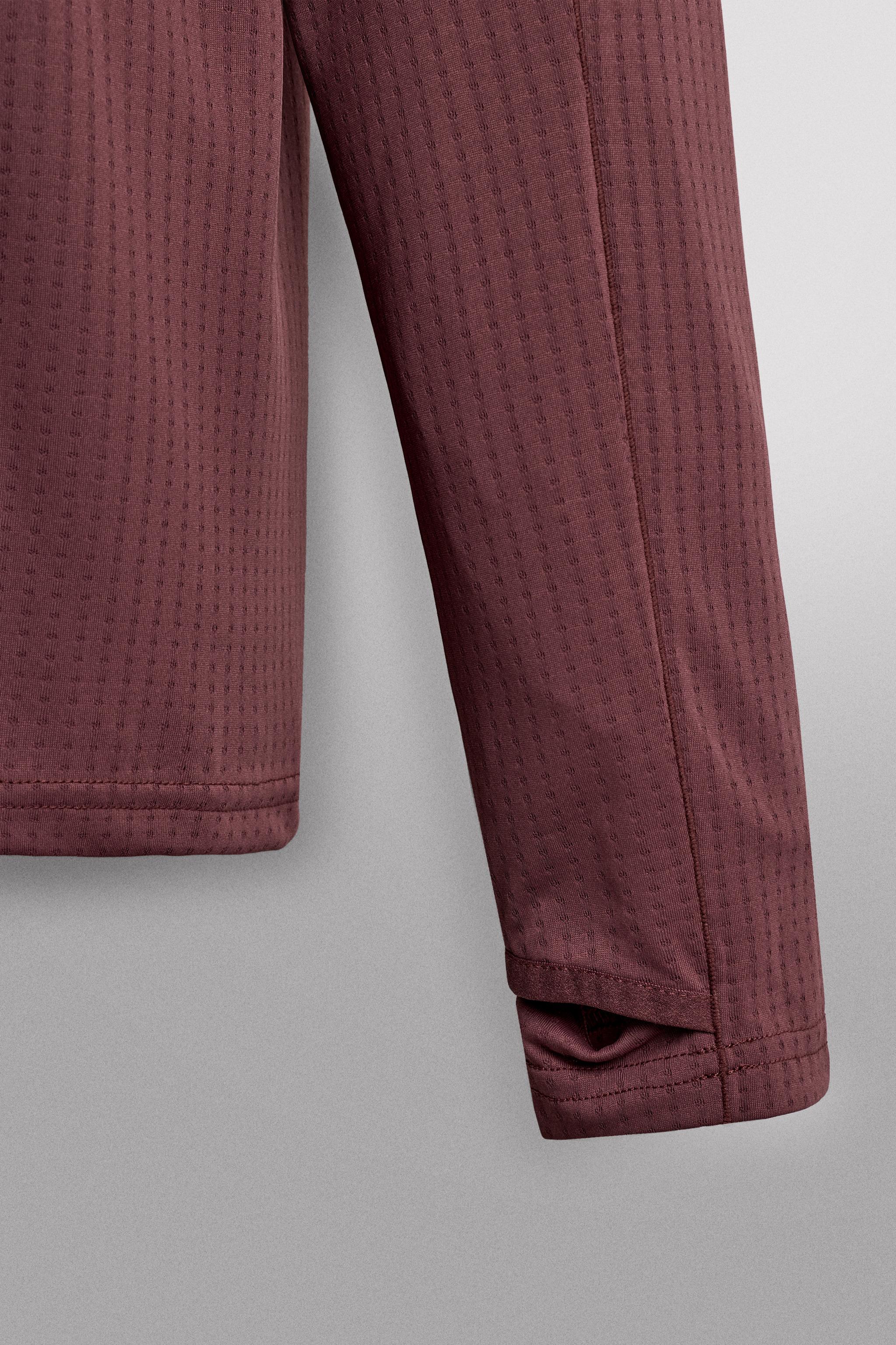 COMBINATION POCKET QUARTER-ZIP SWEATSHIRT