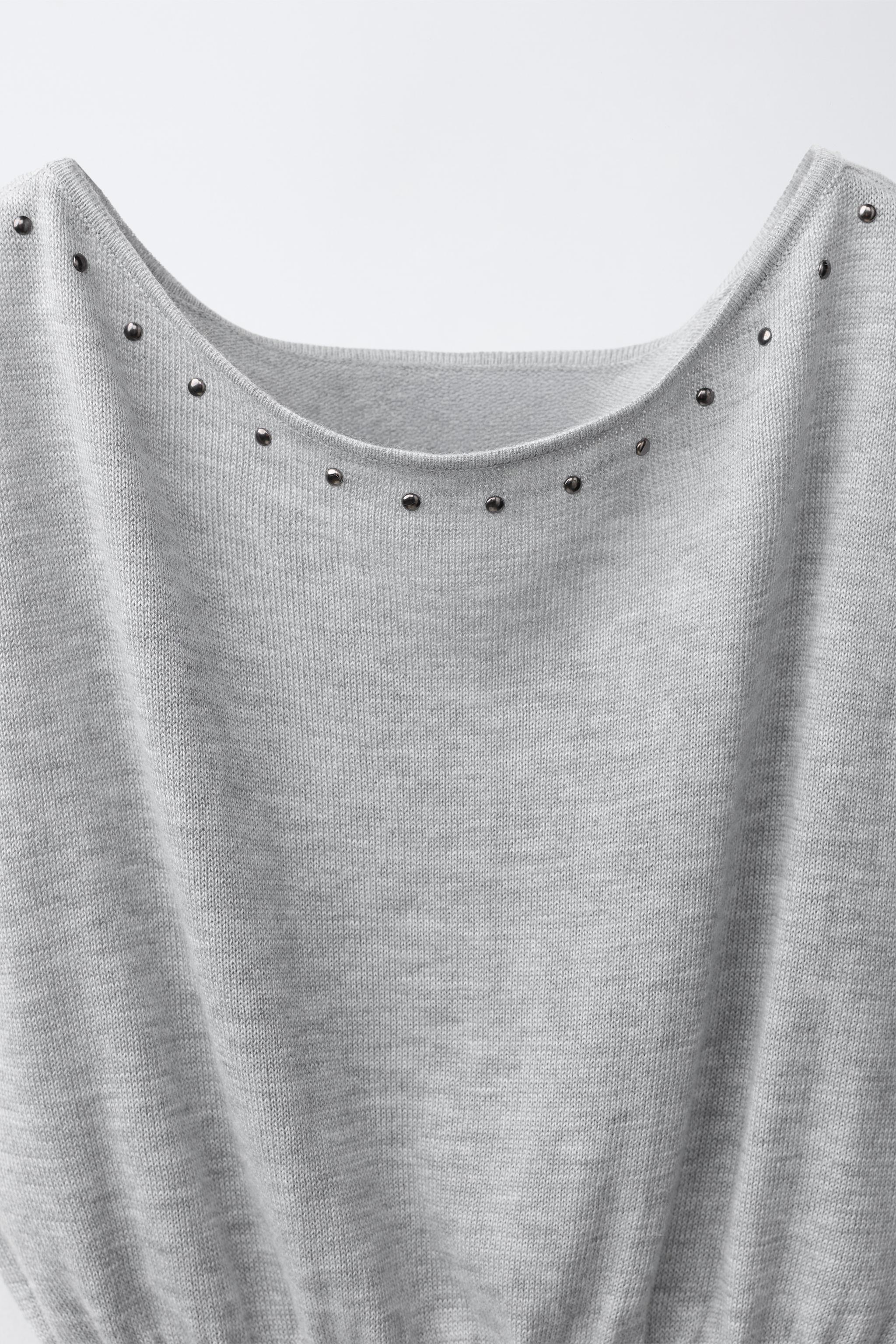 TOP EN MAILLE À CLOUS